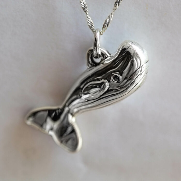 Shop for conservation by purchasing this 925 sterling Silver necklace that resembles a humpback whale to help protect marine megafauna and ocean ecosystems