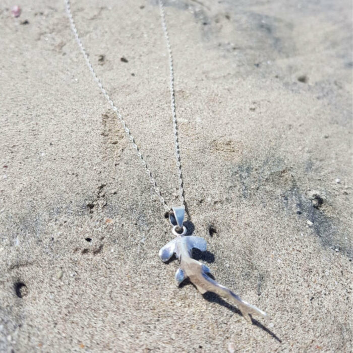 scalloped hammerhead shark necklace made of 925 sterling silver to support marine research and conservation in Central America