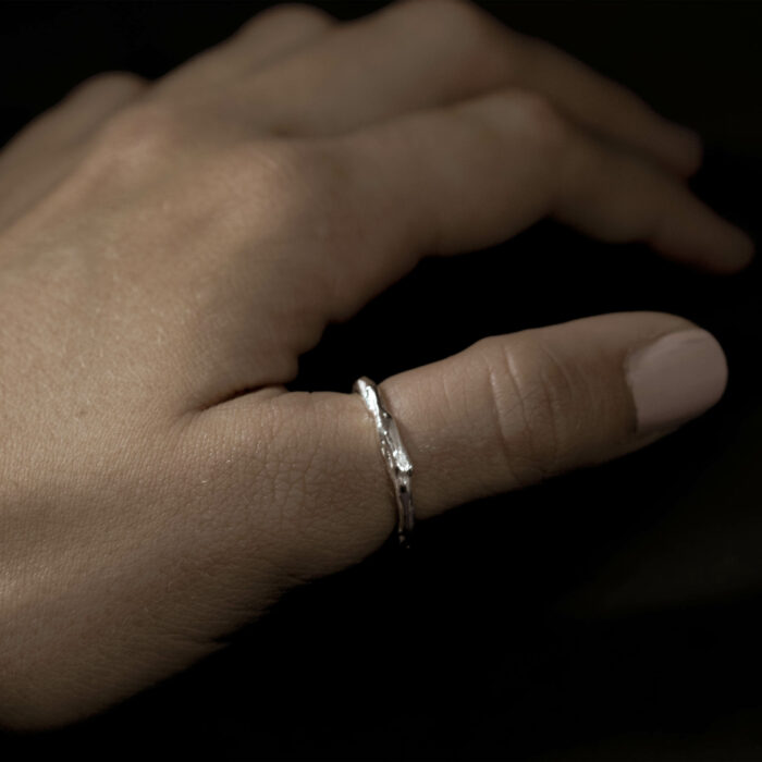 coral bleaching events can cause the polyps to die, leaving only the skeleton of the coral like the one found in this sterling silver ring
