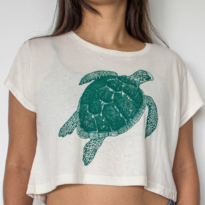 women apparel croptop shirt with a green turtle to support local artisans of costa rica and marine conservation