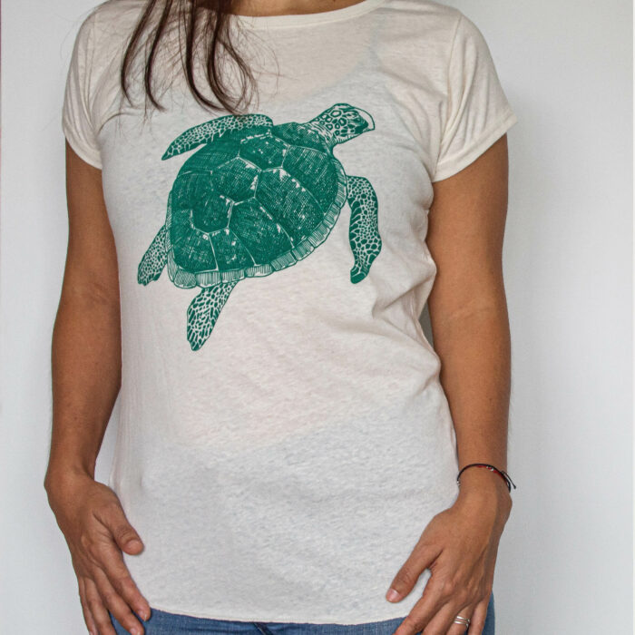 women apparel t-shirt with a green turtle to support local artisans of costa rica and marine conservation