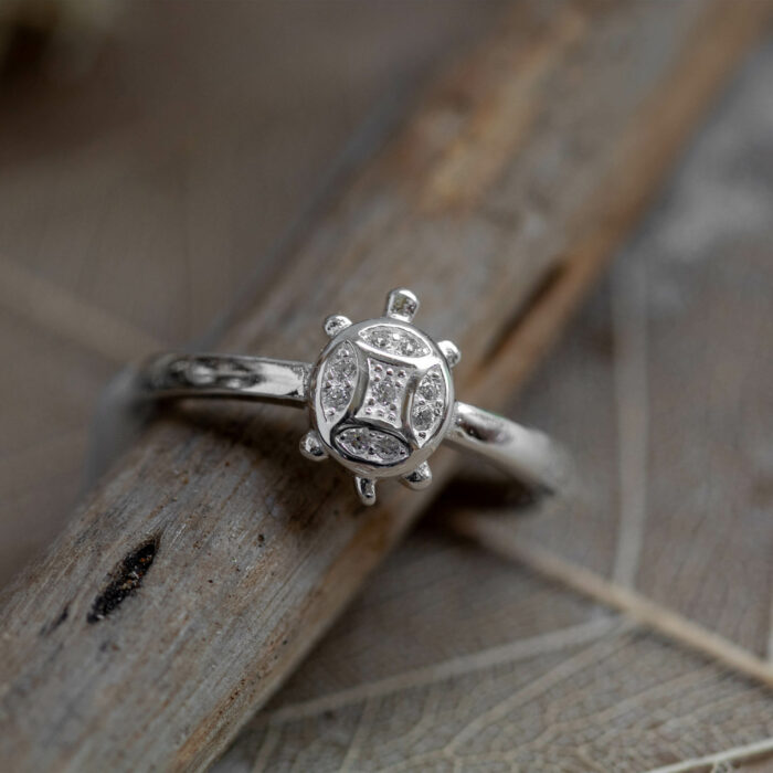 925 sterling silver ring designed like a baby sea turtle, also called a neonate or hatchling, when running towards the ocean for the first time. By purchasing this ring, you support the release of many little turtles in central america