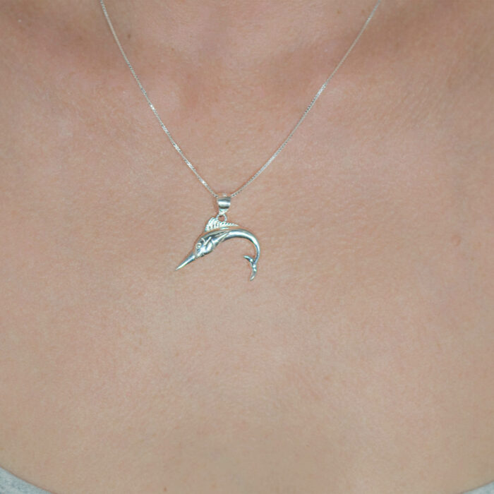 Perfect gift idea for ladies that love sportfishing! Shop for conservation by purchasing this silver necklace that resemble a black marlin billfish to help protect ocean ecosystems and save endangered species from Central America and Costa Rica and support photo identification